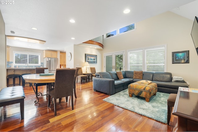 17460 Old Pacific Hwy, Rockaway Beach, OR 97136 - living area with light wood-style floors, recessed lighting, and a high ceiling