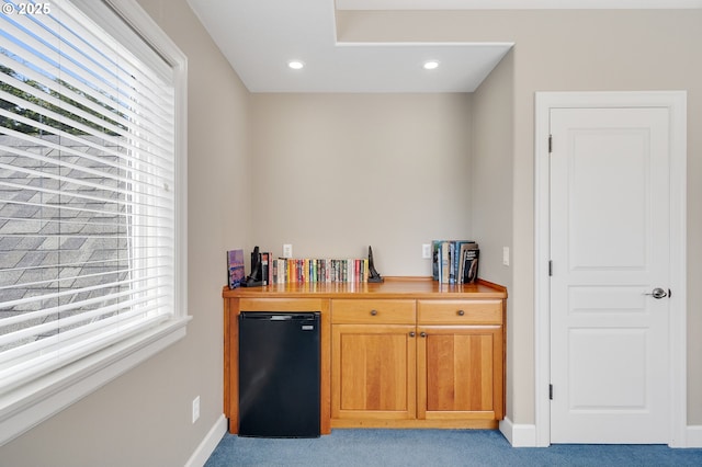17460 Old Pacific Hwy, Rockaway Beach, OR 97136 - indoor dry bar featuring refrigerator, light carpet, baseboards, and recessed lighting