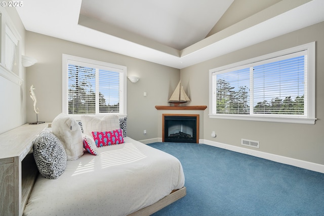 17460 Old Pacific Hwy, Rockaway Beach, OR 97136 - bedroom featuring baseboards, carpet, and a fireplace