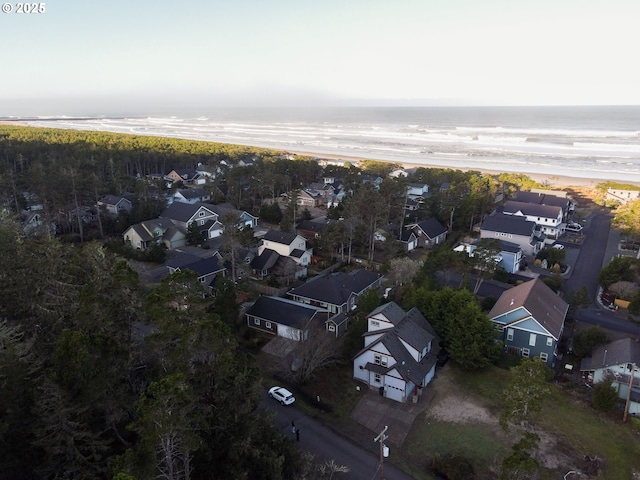 17460 Old Pacific Hwy, Rockaway Beach, OR 97136 - aerial perspective of suburban area featuring waterfront with a beach