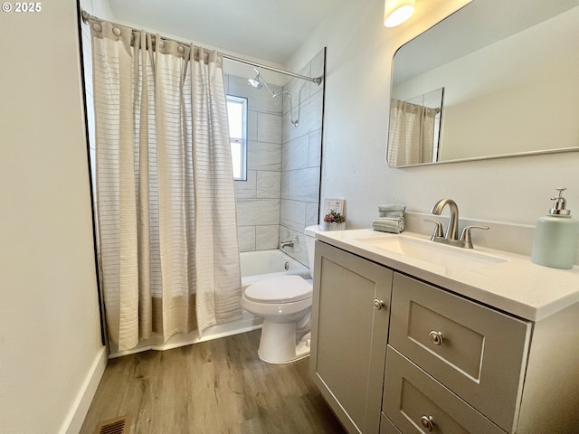 610 NE N St, Hermiston, OR 97838 - full bathroom with wood finished floors, toilet, shower / tub combo with curtain, and vanity
