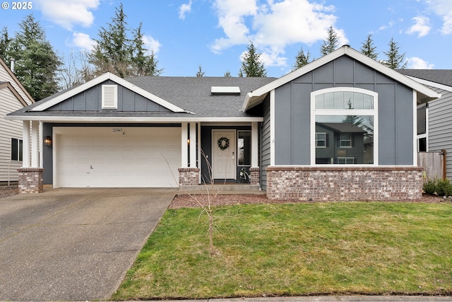 view of front facade featuring an attached garage, brick siding, driveway, a front lawn, and board and batten siding