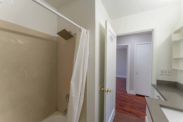 3826 SE 50th Ave, Portland, OR 97206 - full bathroom featuring wood finished floors, vanity, and shower / bath combo with shower curtain