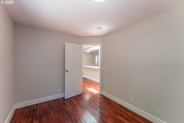 3826 SE 50th Ave, Portland, OR 97206 - unfurnished room with wood-type flooring and baseboards