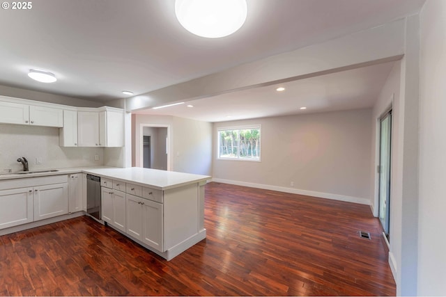 3826 SE 50th Ave, Portland, OR 97206 - kitchen with a peninsula, dark wood-type flooring, open floor plan, and recessed lighting