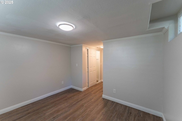 3826 SE 50th Ave, Portland, OR 97206 - unfurnished room with dark wood-style flooring, crown molding, and a textured ceiling