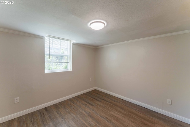 3826 SE 50th Ave, Portland, OR 97206 - empty room with dark wood-type flooring, a textured ceiling, and ornamental molding