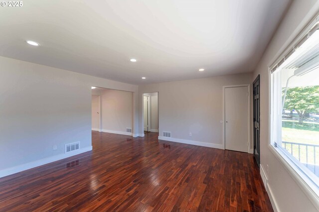 3826 SE 50th Ave, Portland, OR 97206 - empty room featuring dark wood-style flooring and recessed lighting