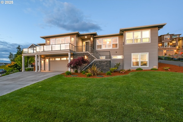 1936 NW Klickitat St, Camas, WA 98607 - view of front of house with stone siding, driveway, stairway, and a front lawn