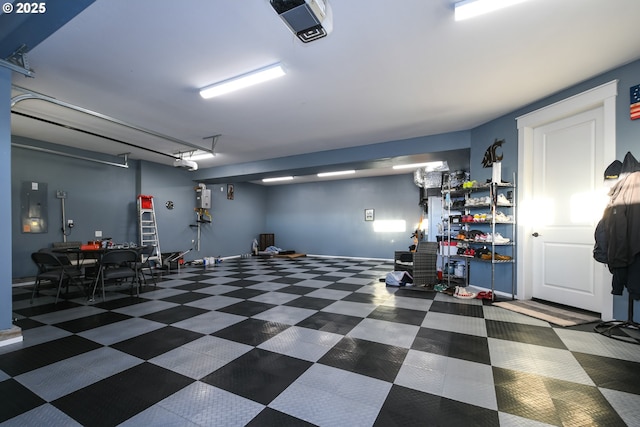 1936 NW Klickitat St, Camas, WA 98607 - garage featuring baseboards and a garage door opener