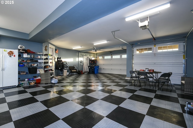 1936 NW Klickitat St, Camas, WA 98607 - garage with freestanding refrigerator and a garage door opener