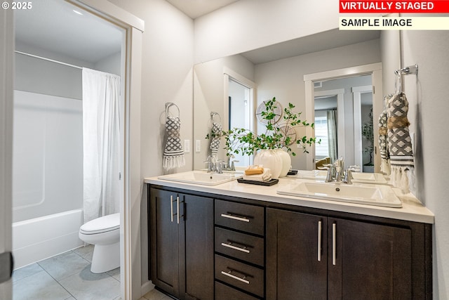 31713 NW Turel Dr, North Plains, OR 97133 - bathroom with double vanity, toilet, shower / tub combo, and tile patterned floors