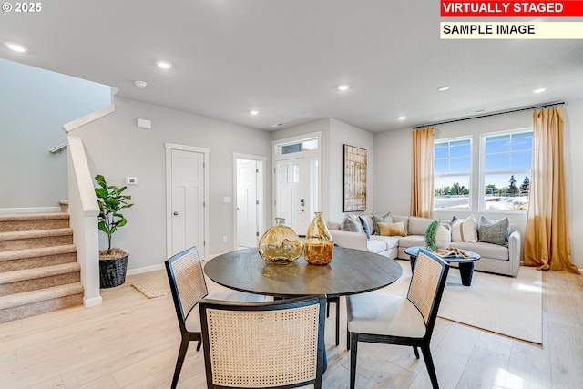 31713 NW Turel Dr, North Plains, OR 97133 - dining area featuring light wood finished floors, stairs, recessed lighting, and baseboards