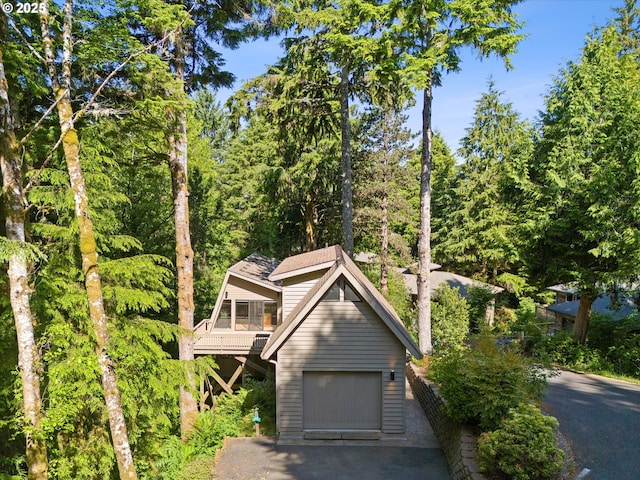 563 Fairway Dr, Gleneden Beach, OR 97388 - view of front of house featuring a garage