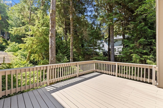 563 Fairway Dr, Gleneden Beach, OR 97388 - deck featuring view of scattered trees