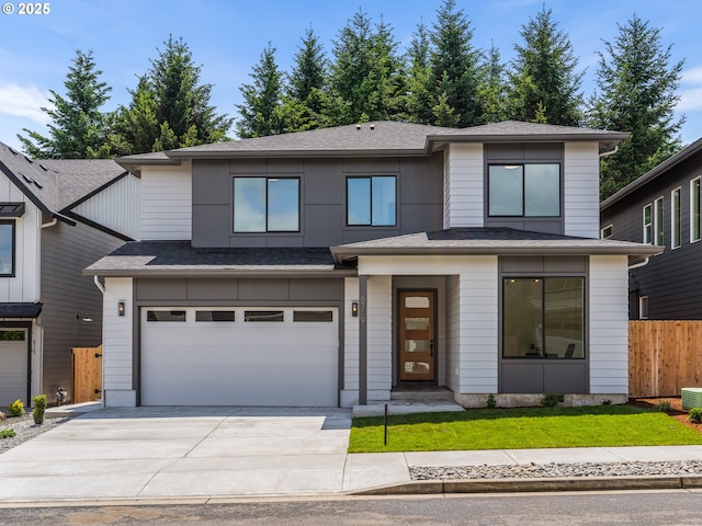 6719 NE 132nd St, Vancouver, WA 98686 - view of front facade with driveway, an attached garage, and a shingled roof