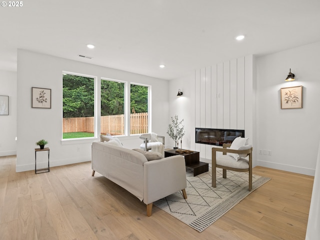6719 NE 132nd St, Vancouver, WA 98686 - living area with light wood-style flooring, a fireplace, baseboards, and recessed lighting