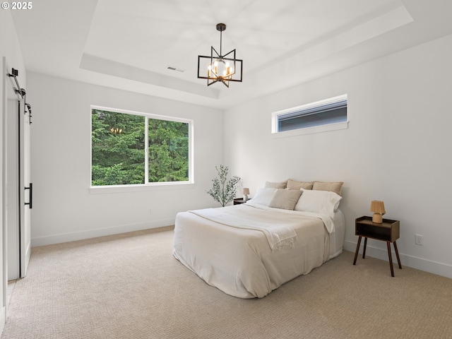 6719 NE 132nd St, Vancouver, WA 98686 - bedroom featuring a raised ceiling, a chandelier, light colored carpet, and baseboards