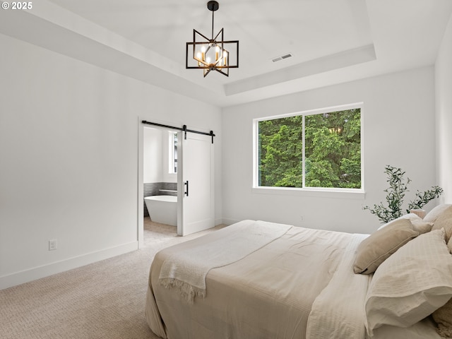 6719 NE 132nd St, Vancouver, WA 98686 - bedroom featuring a barn door, baseboards, light carpet, a chandelier, and a raised ceiling