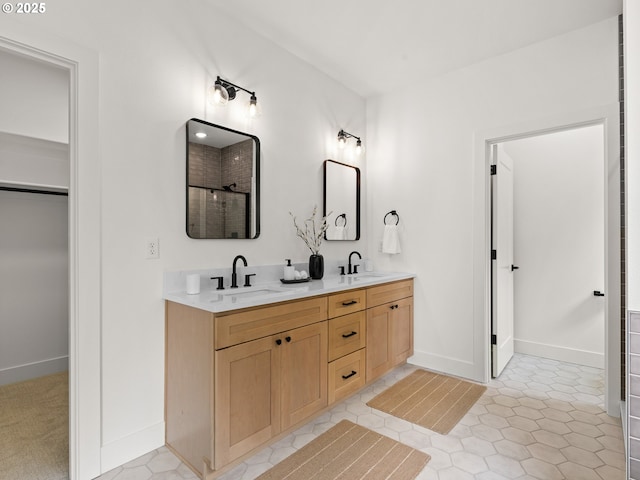 6719 NE 132nd St, Vancouver, WA 98686 - bathroom with double vanity, baseboards, a shower, and tile patterned floors