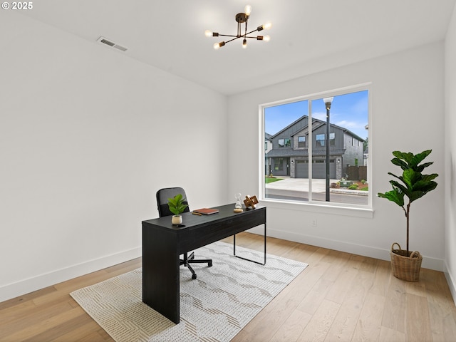 6719 NE 132nd St, Vancouver, WA 98686 - office area featuring a chandelier, baseboards, and light wood finished floors