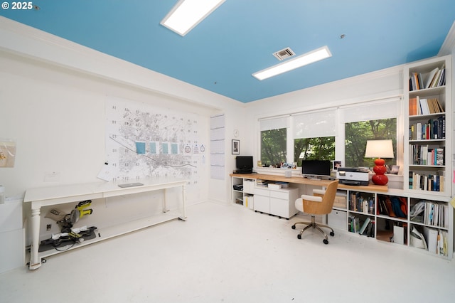 office area featuring concrete flooring