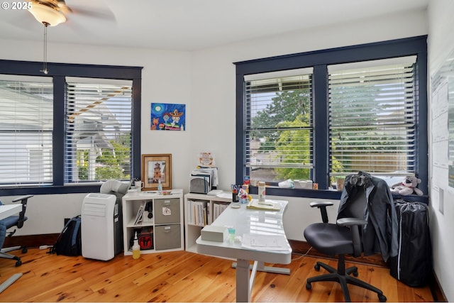 7809 NE Everett St, Portland, OR 97213 - office area featuring wood finished floors and a ceiling fan