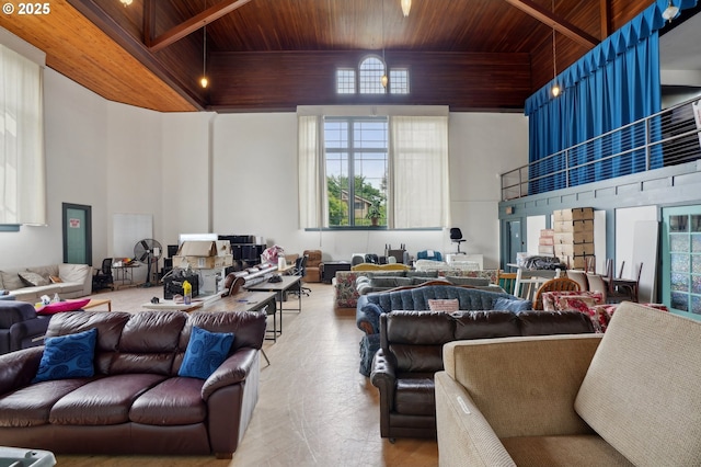 7809 NE Everett St, Portland, OR 97213 - living room featuring a towering ceiling, wood ceiling, healthy amount of natural light, and wood finished floors
