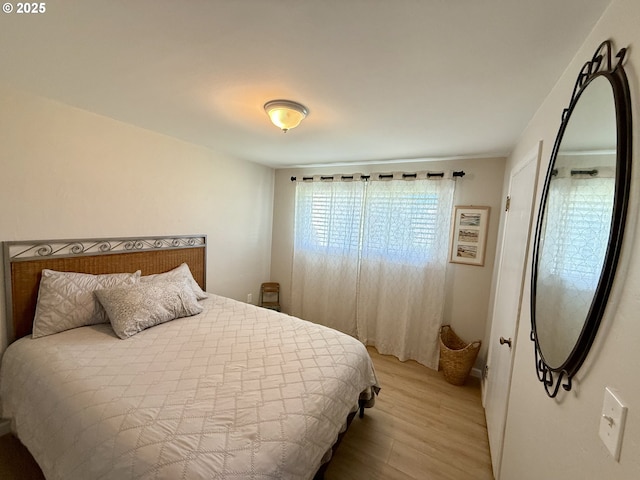 1206 Iris St, Brookings, OR 97415 - bedroom with light wood-style flooring