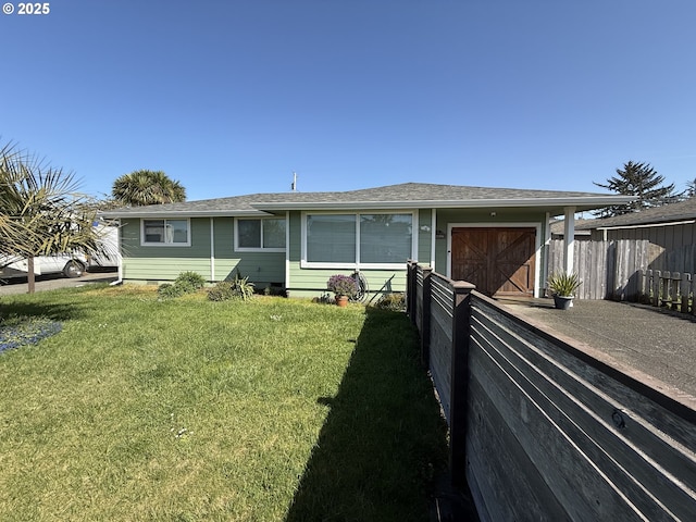 1206 Iris St, Brookings, OR 97415 - view of front of house with a garage