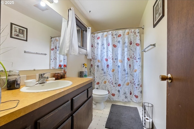 full bath with toilet, tile patterned floors, and vanity