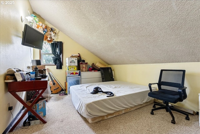 bedroom featuring light carpet, vaulted ceiling, and a textured ceiling