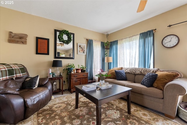 living room featuring ceiling fan