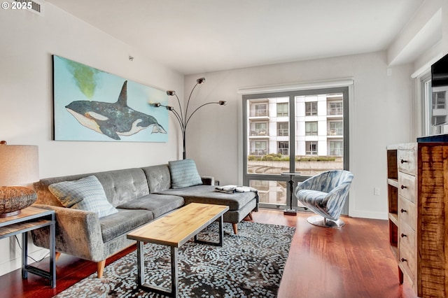 1260 NW Naito Pkwy Unit 103, Portland, OR 97209 - living room with wood finished floors