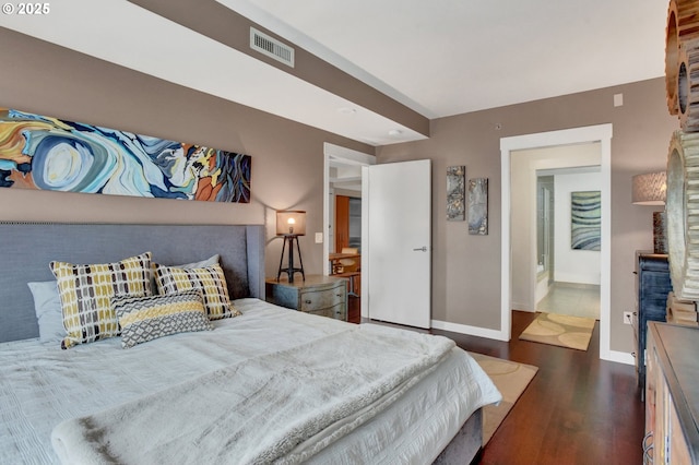 1260 NW Naito Pkwy Unit 103, Portland, OR 97209 - bedroom with wood finished floors and baseboards