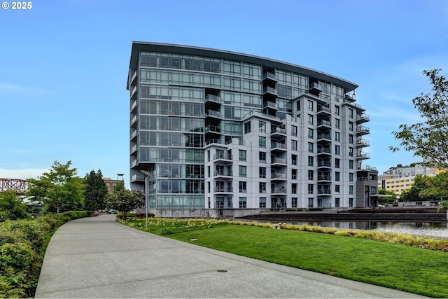 1260 NW Naito Pkwy Unit 103, Portland, OR 97209 - view of apartment building / complex featuring a water view