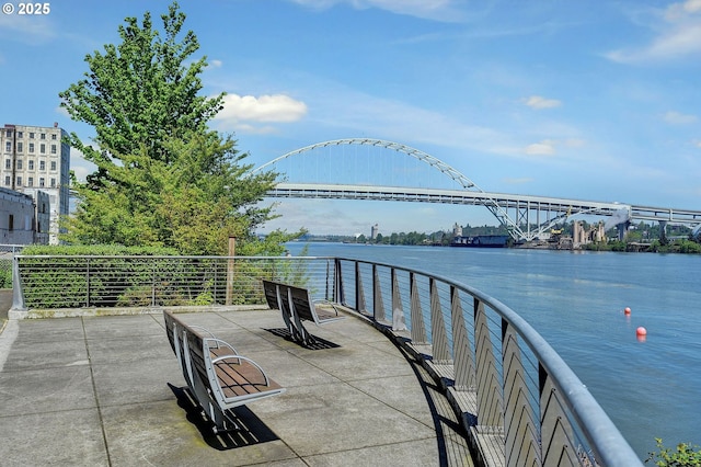 1260 NW Naito Pkwy Unit 103, Portland, OR 97209 - view of patio featuring a water view
