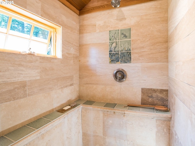 full bathroom featuring tiled shower