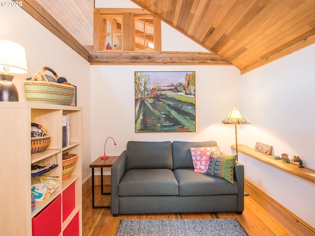 living area featuring wooden ceiling, lofted ceiling, and hardwood / wood-style flooring