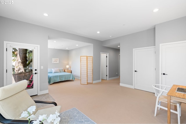 bedroom with access to outside, light carpet, and recessed lighting