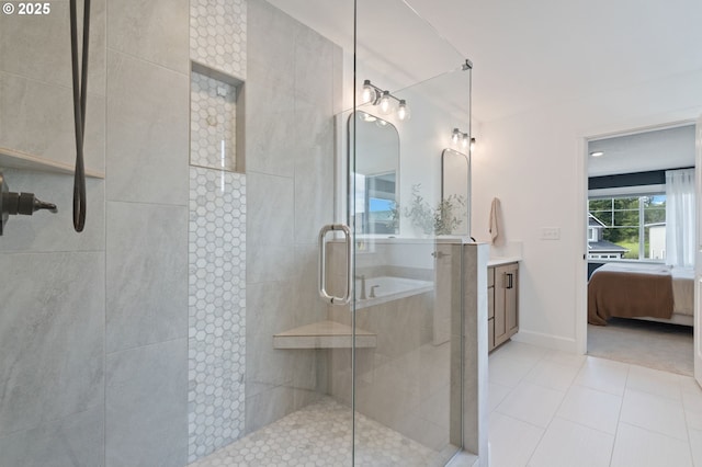 4815 S 12th Cir, Ridgefield, WA 98642 - full bathroom with tiled shower, vanity, ensuite bath, and tile patterned floors