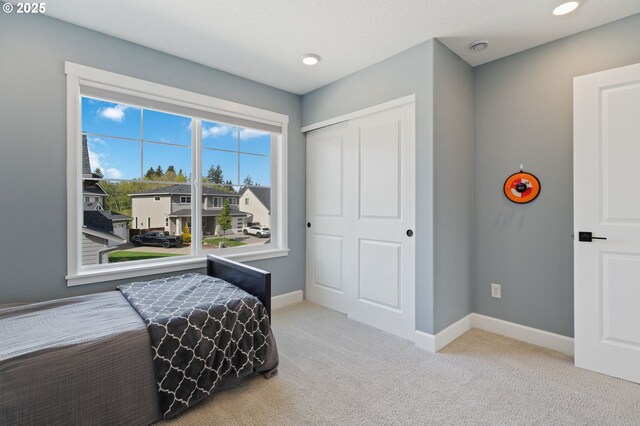 4815 S 12th Cir, Ridgefield, WA 98642 - carpeted bedroom featuring baseboards and a closet