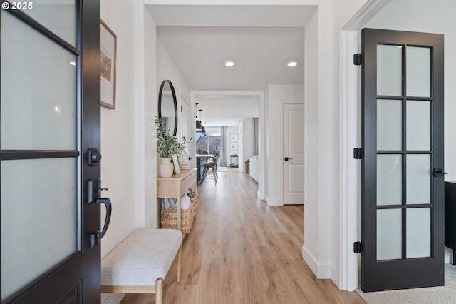 4815 S 12th Cir, Ridgefield, WA 98642 - entryway with light wood-style flooring, baseboards, and recessed lighting