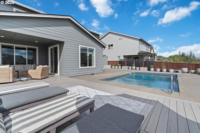 4815 S 12th Cir, Ridgefield, WA 98642 - view of swimming pool with outdoor lounge area, fence, and a wooden deck