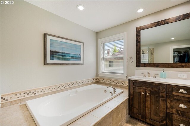 full bath featuring a garden tub, a shower, vanity, tile patterned floors, and recessed lighting