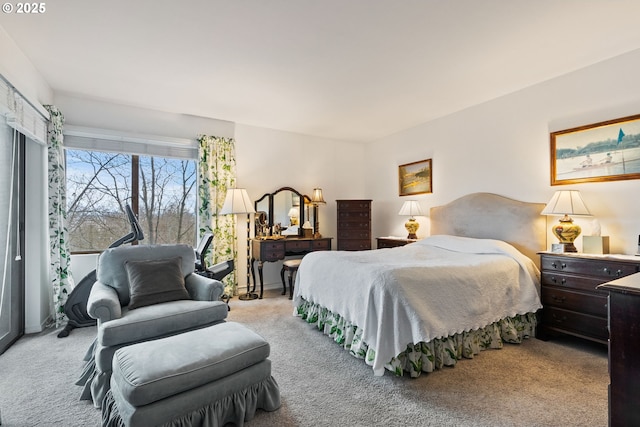 bedroom featuring light colored carpet