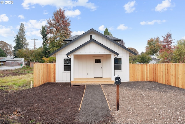 view of outdoor structure featuring fence
