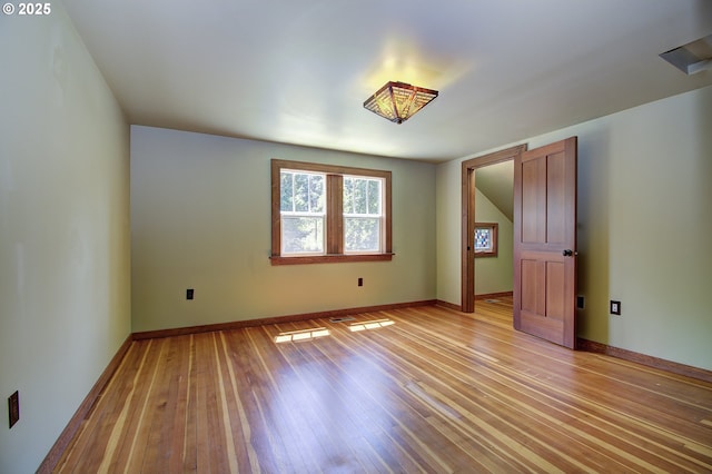 empty room featuring light hardwood / wood-style floors