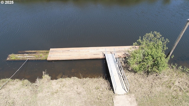 exterior space with a water view