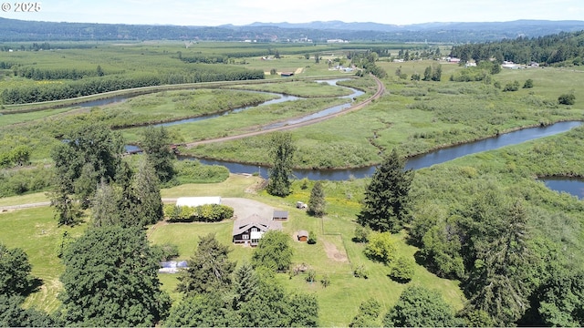 aerial view with a water view and a rural view